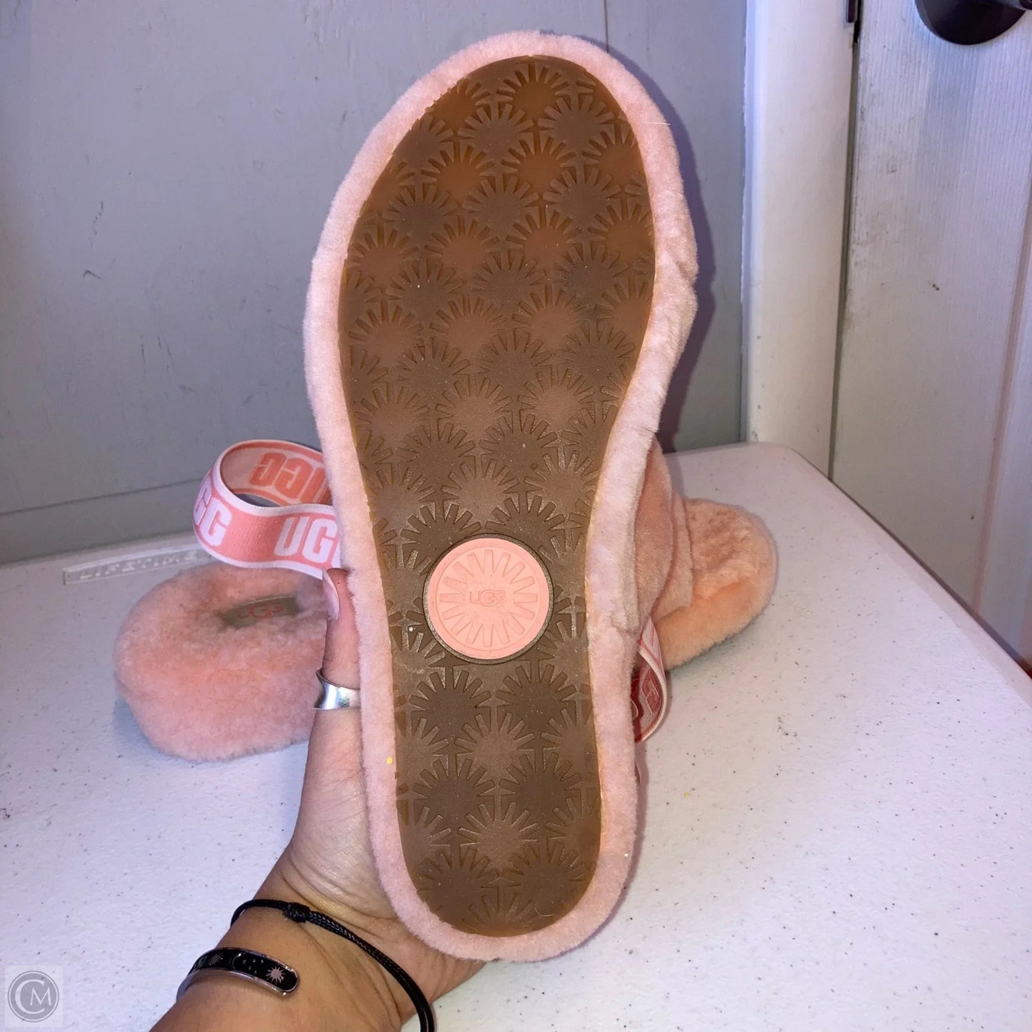 Slippers Designer By Ugg In Peach, Size: 9