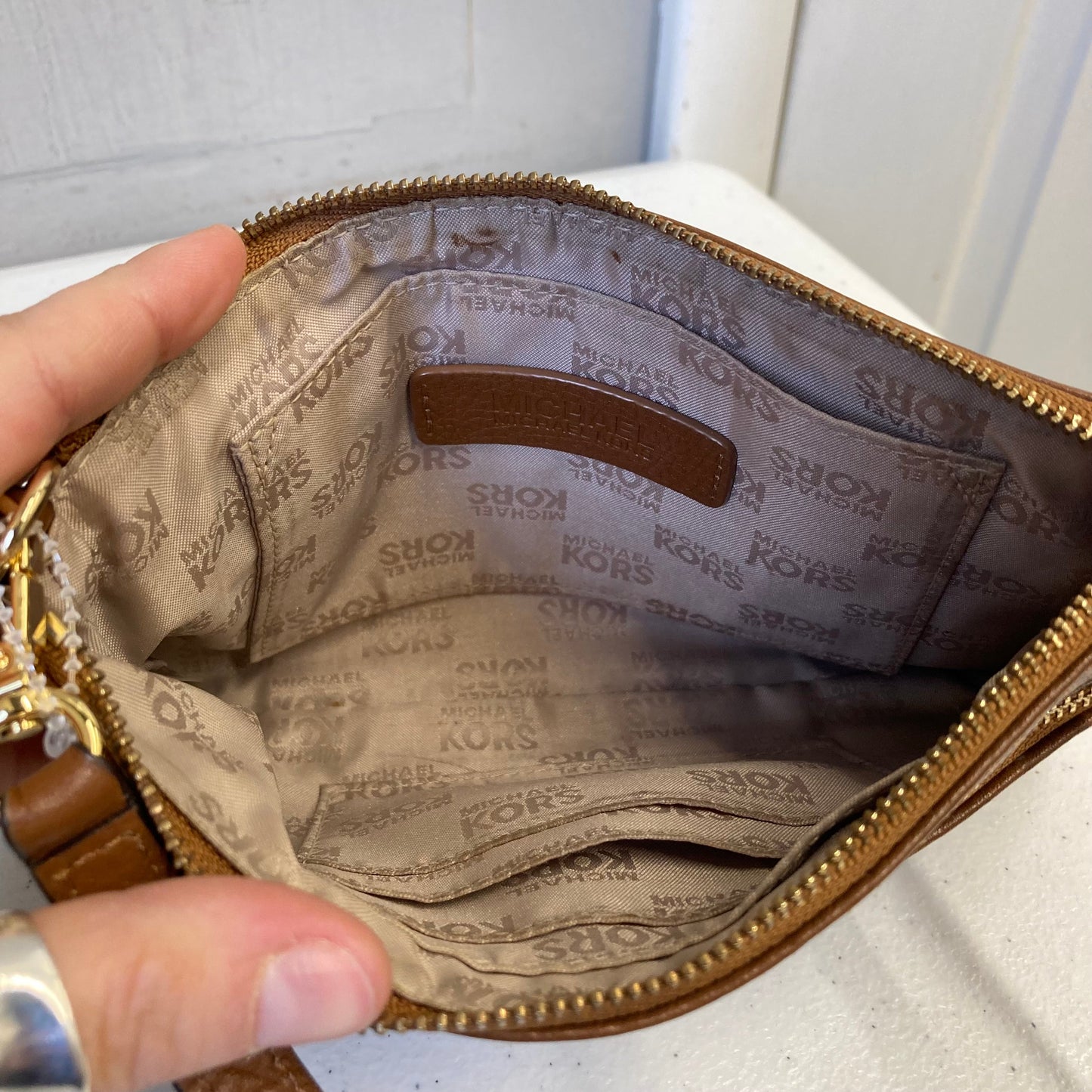 Wristlet Designer By Michael Kors In Brown, Size:Medium