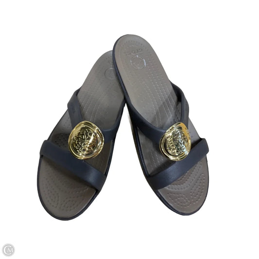 Sandals Flats By Crocs In Brown, Size: 10