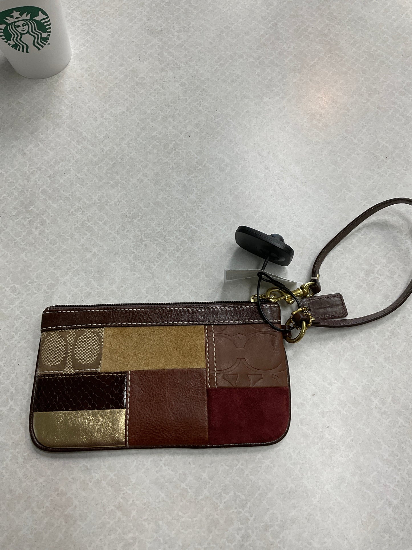 Wristlet Designer By Coach, Size: Medium