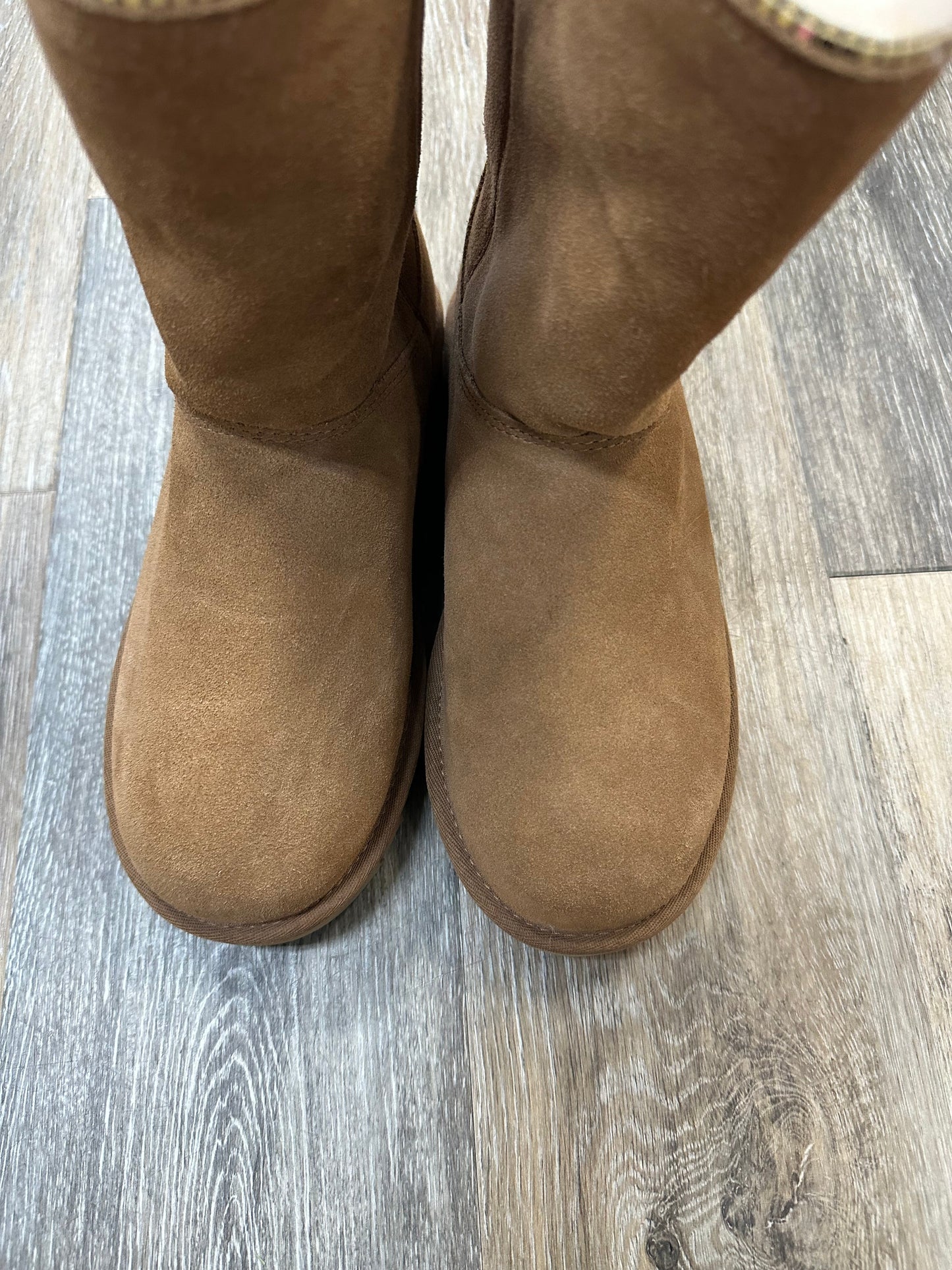 Boots Designer By Ugg In Tan, Size: 7