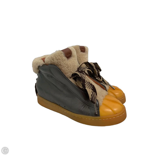 Boots Designer By Coach In Grey, Size: 6