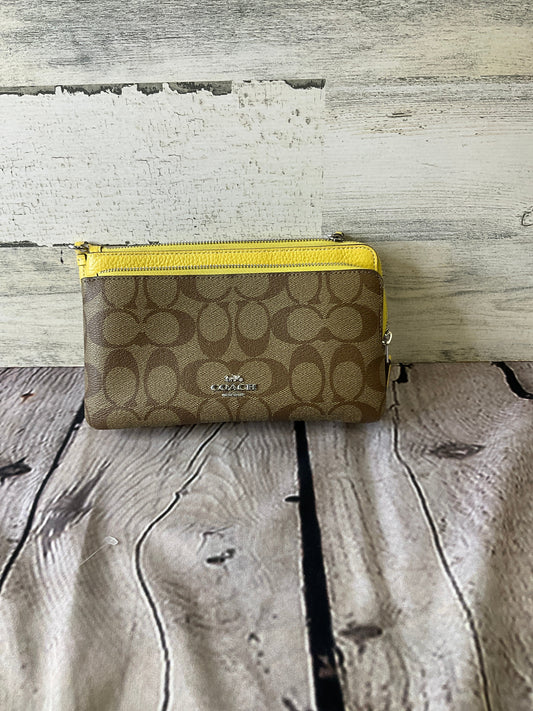 Wristlet Designer By Coach, Size: Medium