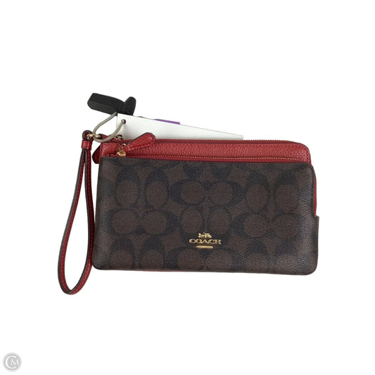 Wristlet Designer By Coach, Size: Medium