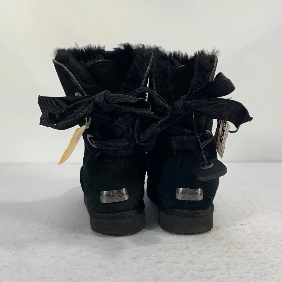 Boots Designer By Ugg In Black, Size: 7