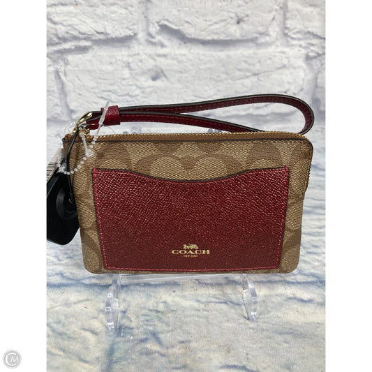 Wristlet Designer By Coach, Size: Medium