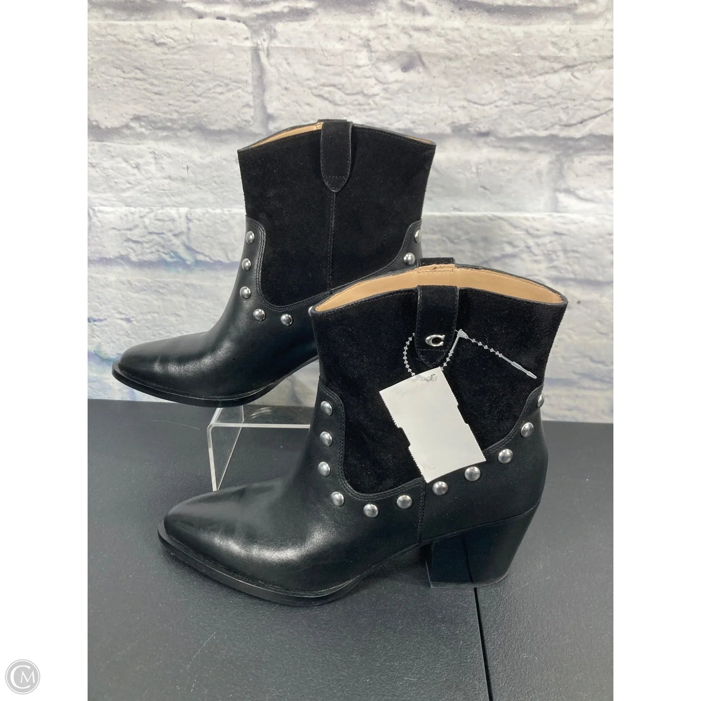 Boots Designer By Coach In Black & Silver, Size: 6