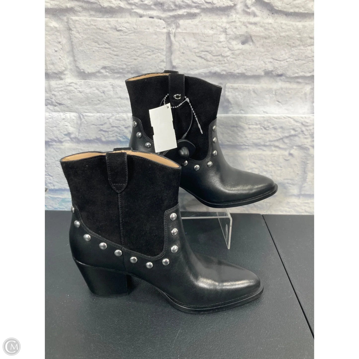 Boots Designer By Coach In Black & Silver, Size: 6
