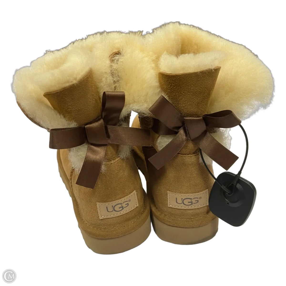 Boots Designer By Ugg In Brown, Size: 9