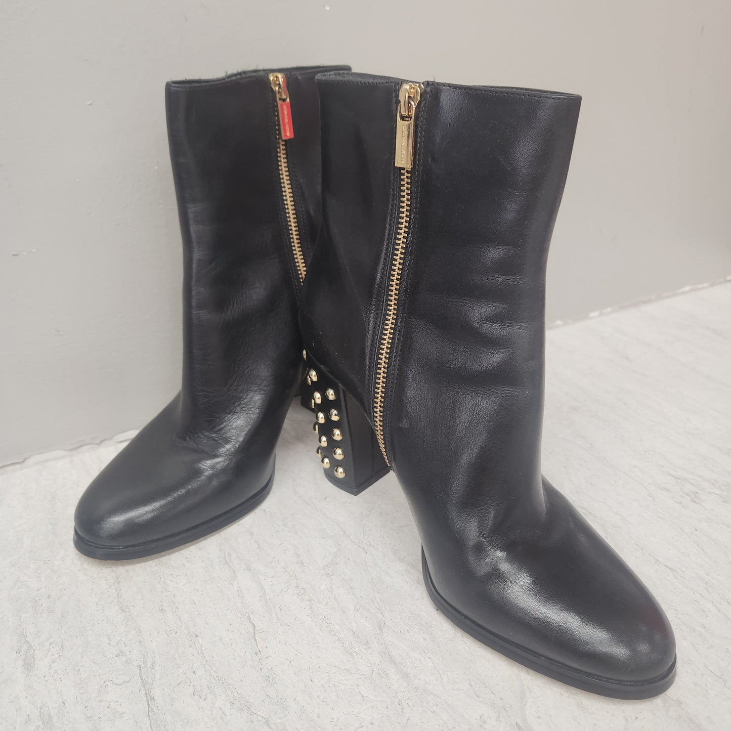 Boots Designer By Michael Kors In Black & Gold, Size: 9.5