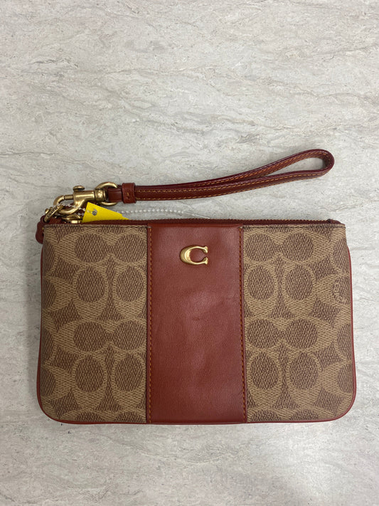 Wristlet Designer By Coach, Size: Large