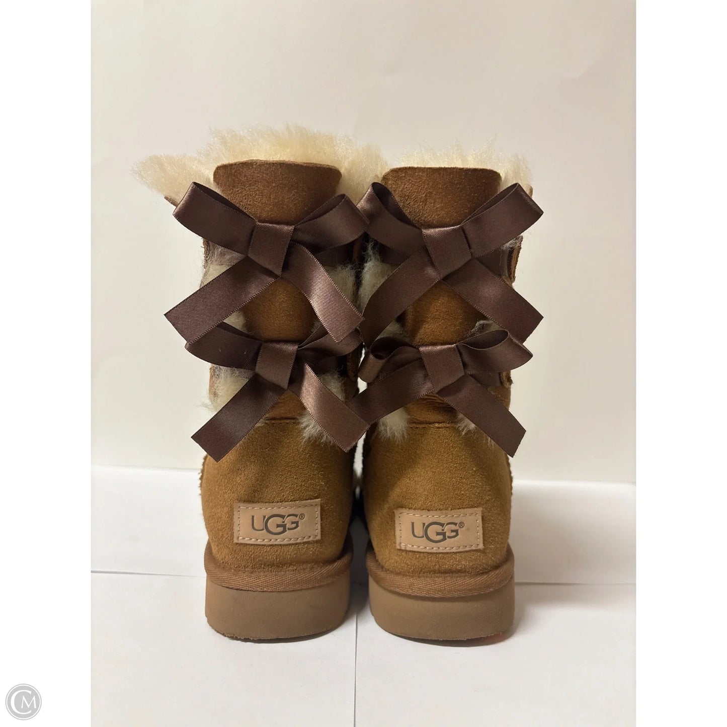 Boots Designer By Ugg In Brown, Size: 7