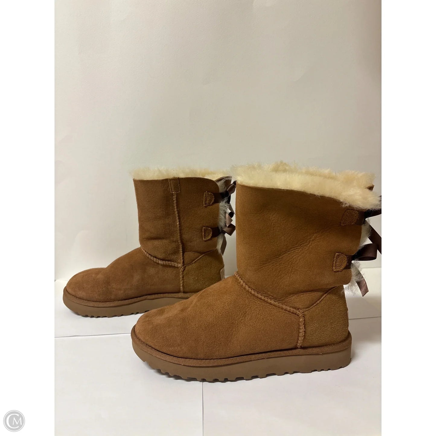 Boots Designer By Ugg In Brown, Size: 7