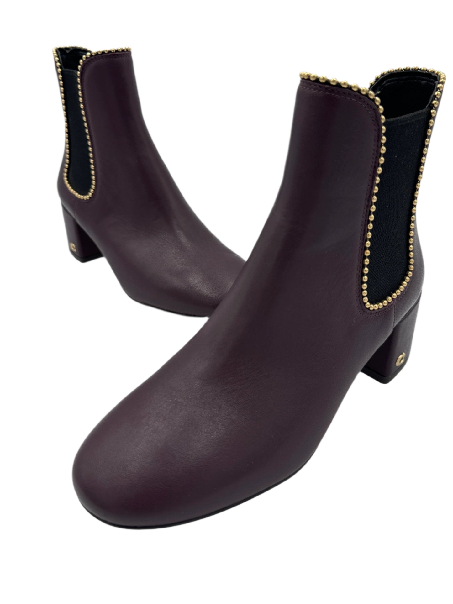 Boots Designer By Coach In Plum, Size: 5.5