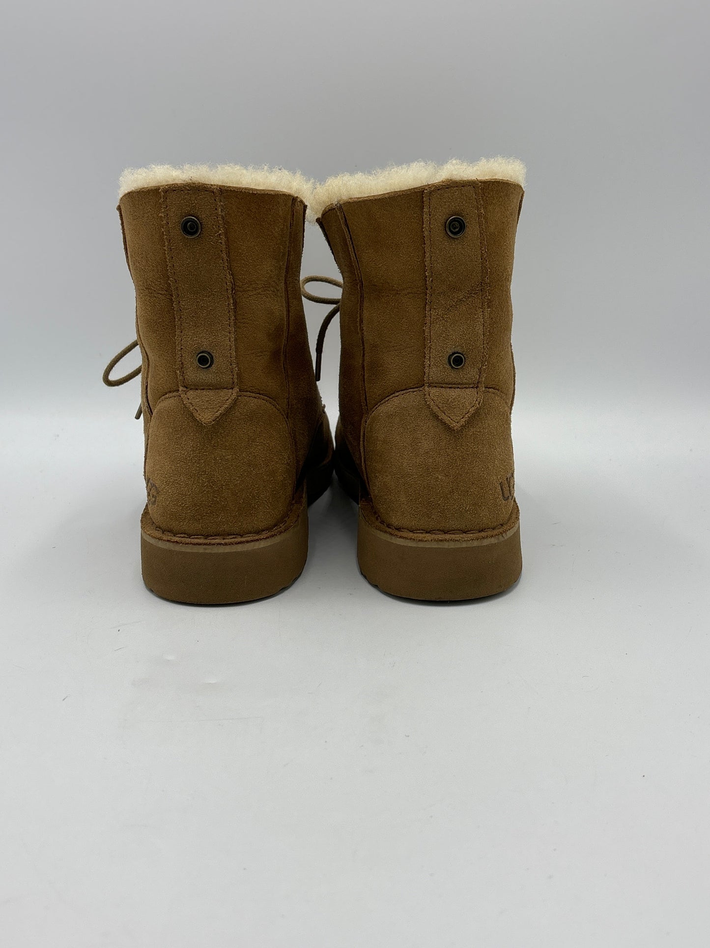 Boots Designer By Ugg In Brown, Size: 7