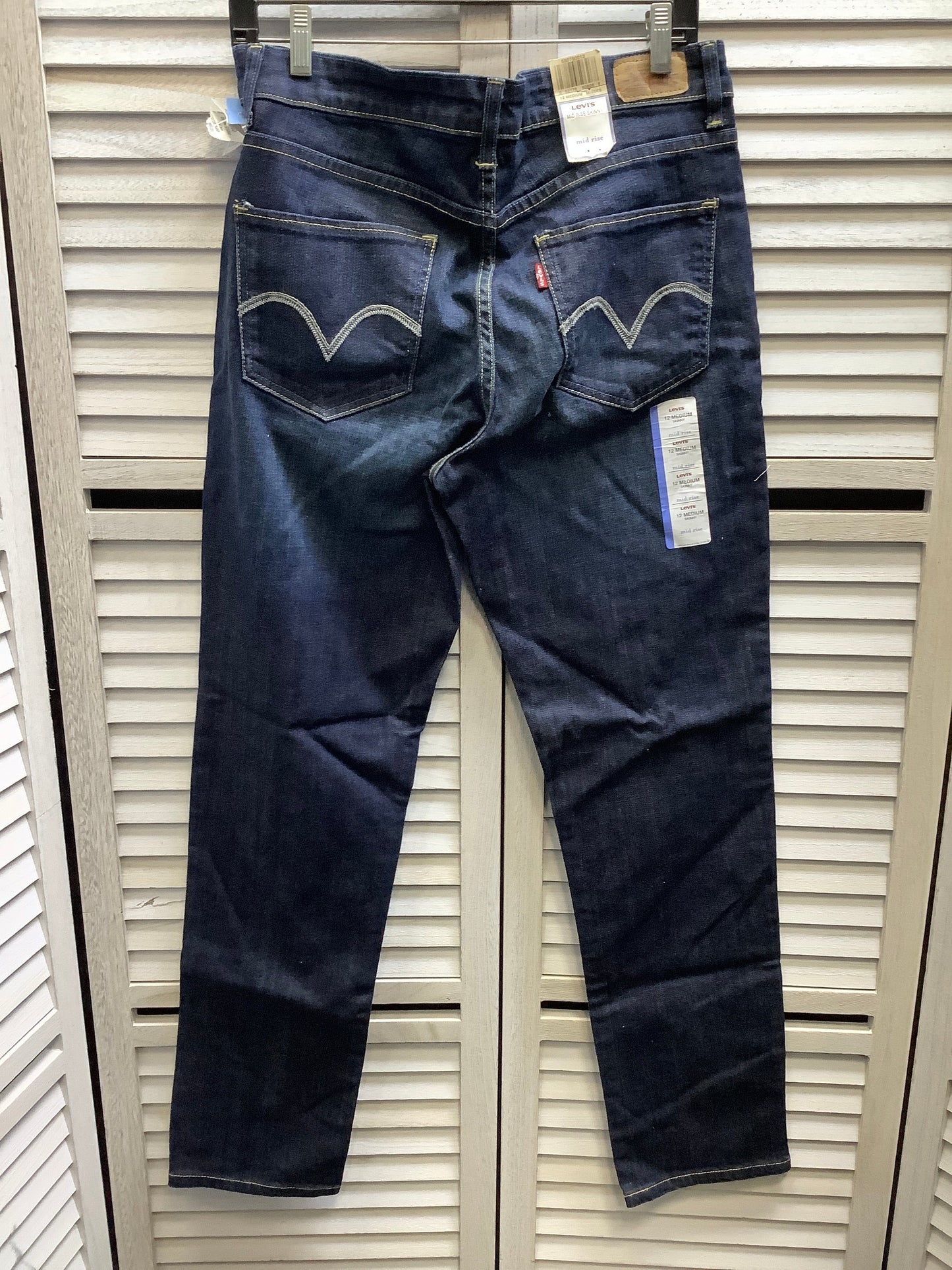 Jeans Boot Cut By Levis In Blue Denim, Size: 12