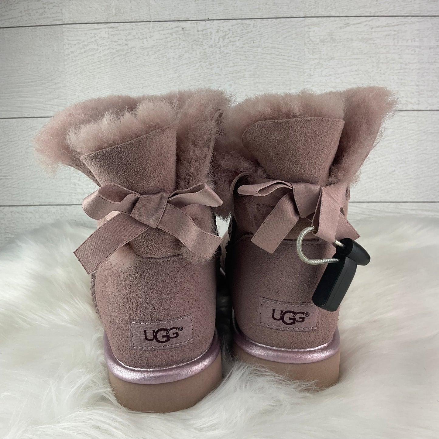 Boots Designer By Ugg In Pink, Size: 8