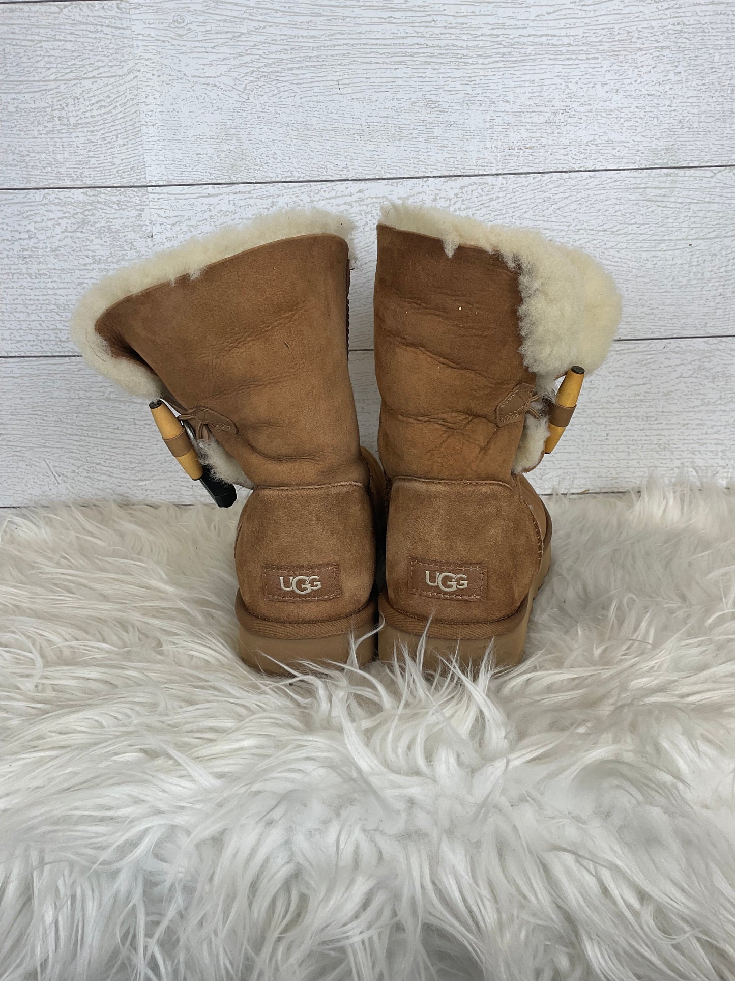 Boots Designer By Ugg In Brown, Size: 10