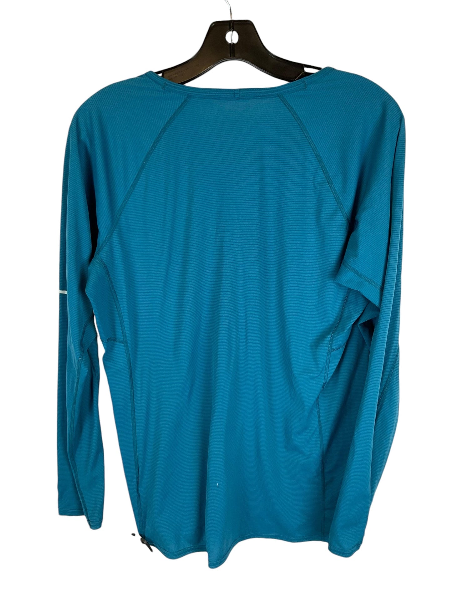 Top Long Sleeve Designer By Patagonia In Blue, Size: Xl