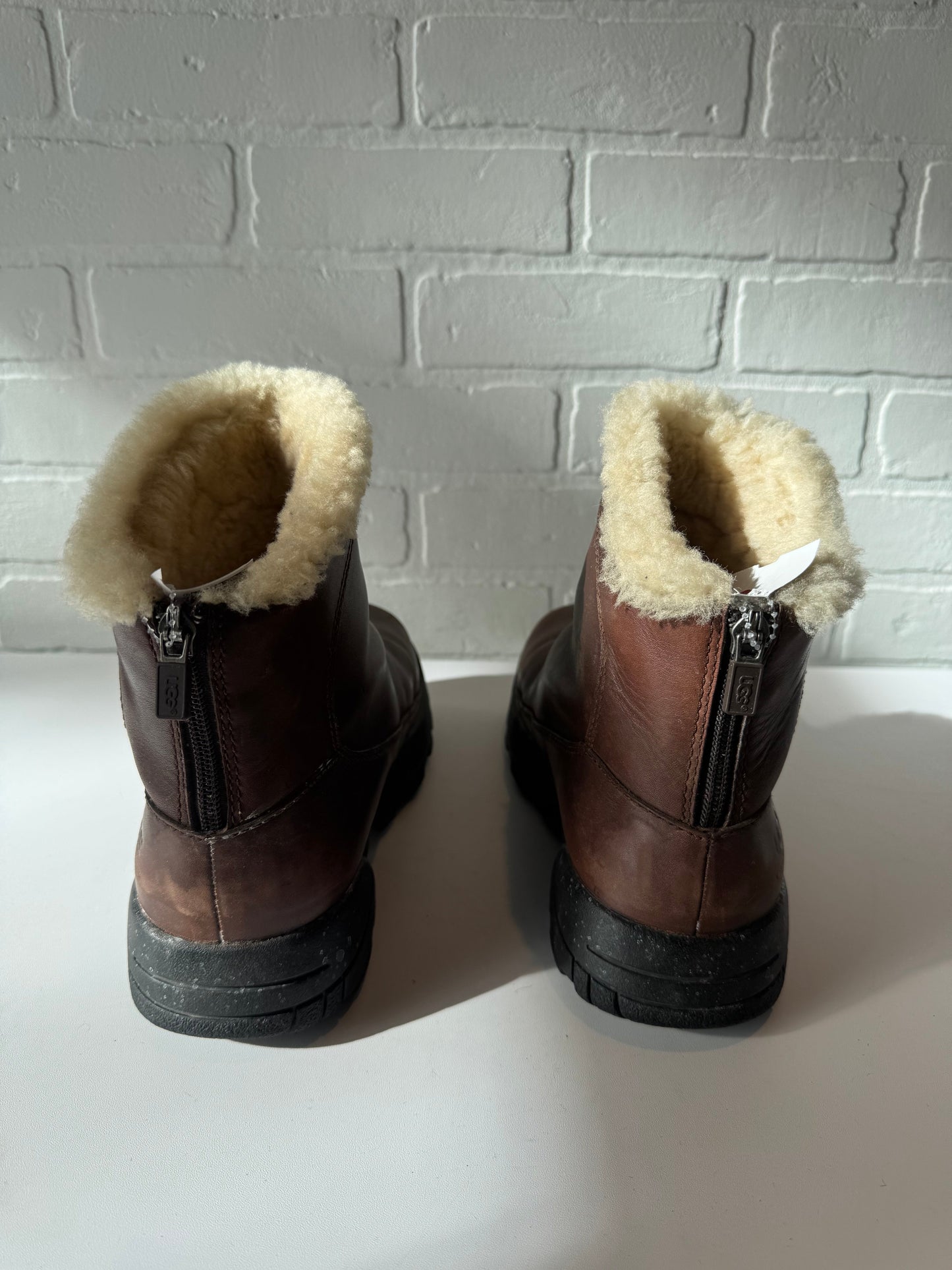 Boots Designer By Ugg In Brown, Size: 9