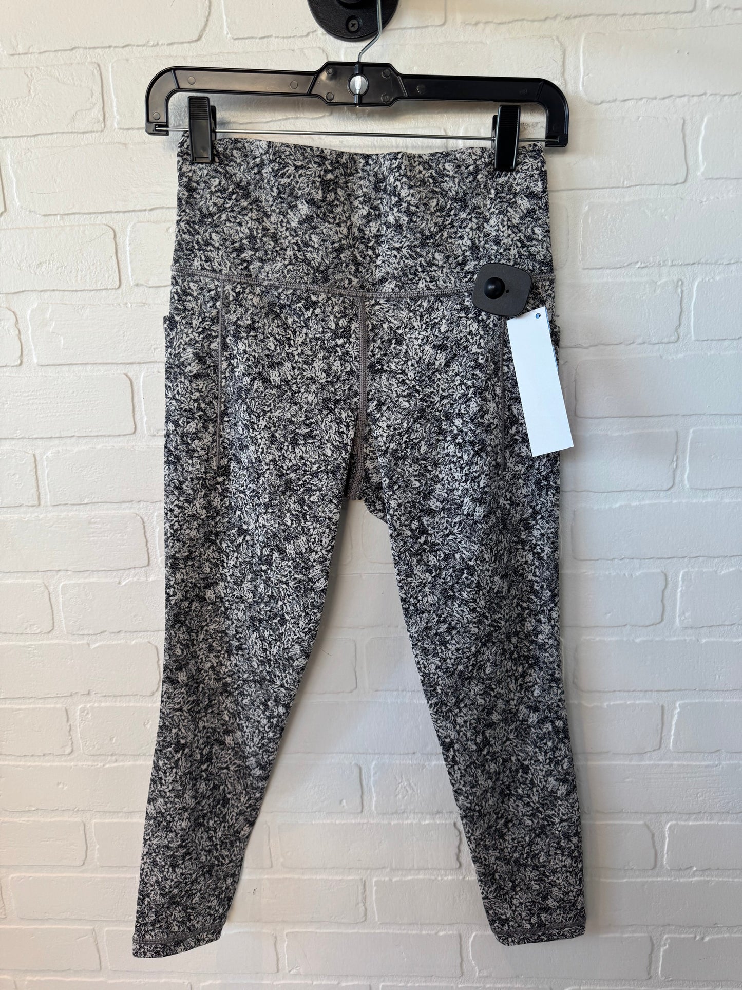 Athletic Leggings By Athleta In Grey & White, Size: 4