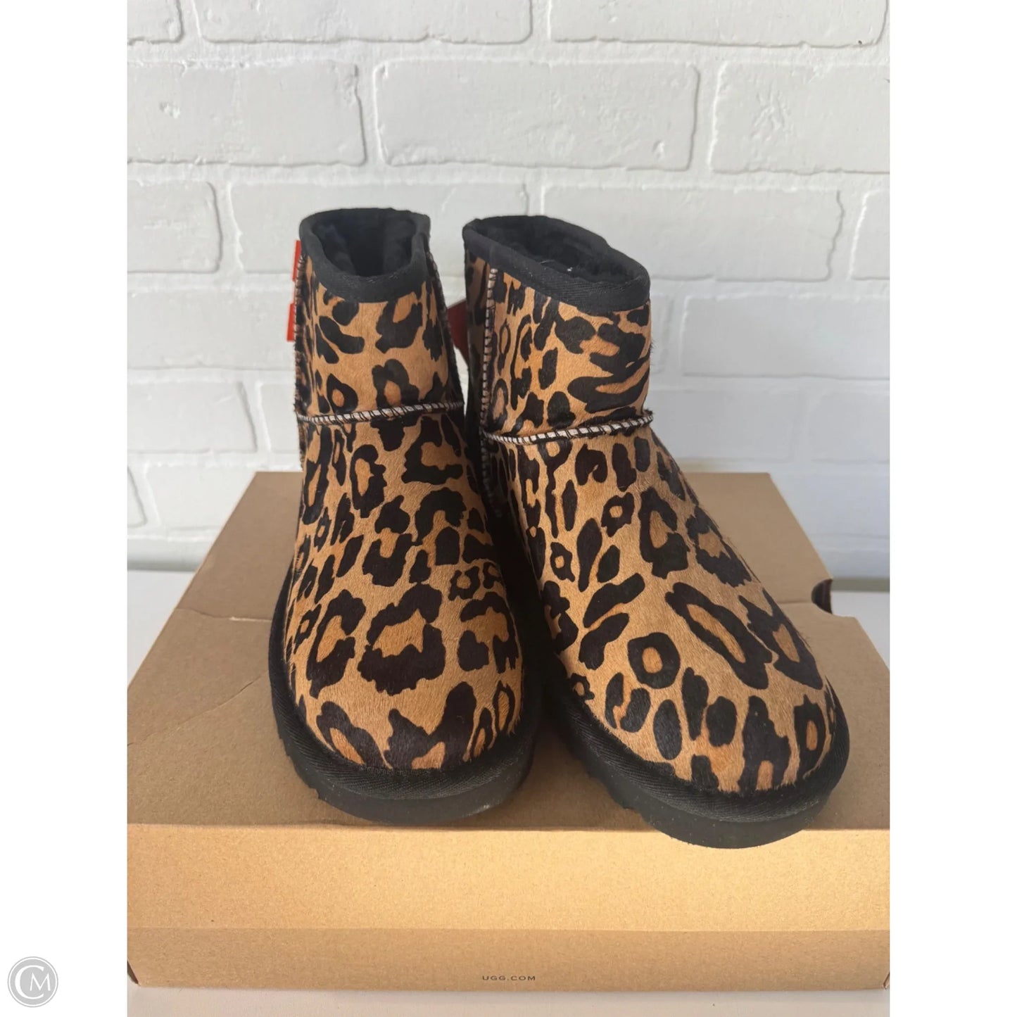 Boots Designer By Ugg In Animal Print, Size: 7