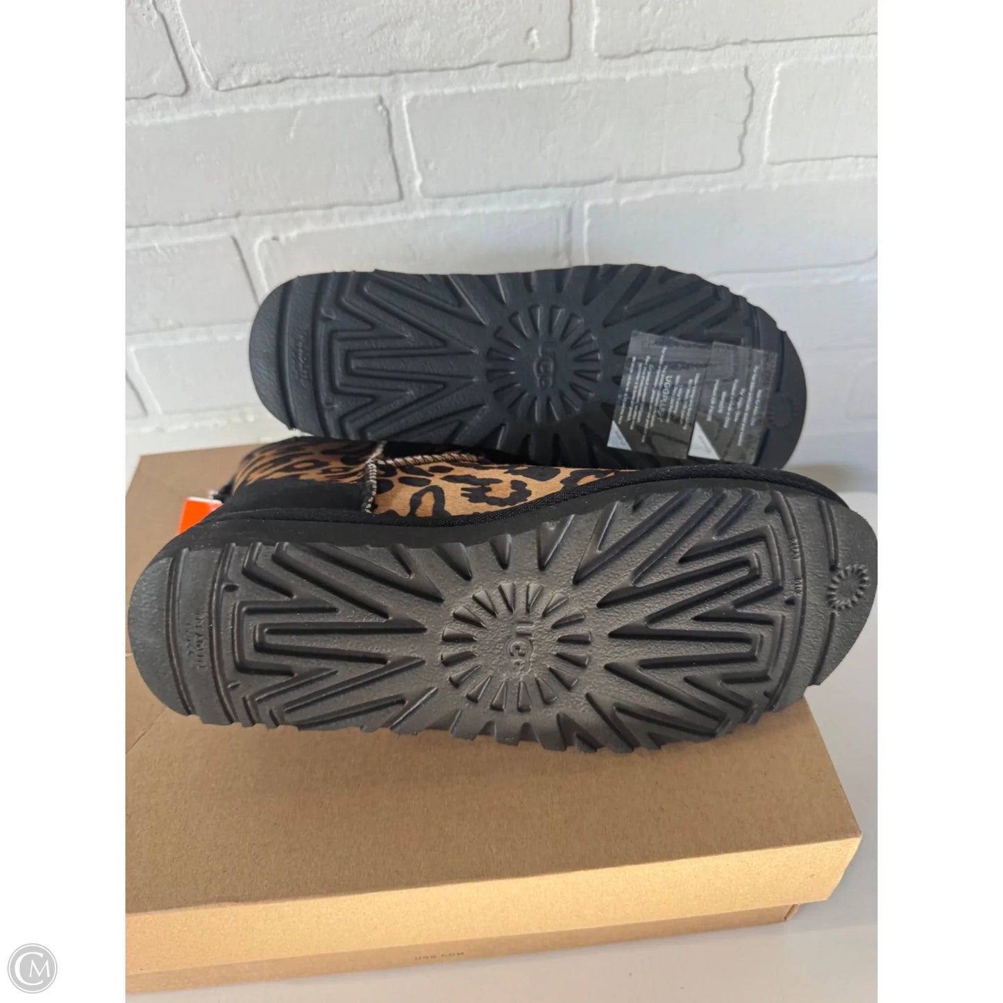 Boots Designer By Ugg In Animal Print, Size: 7