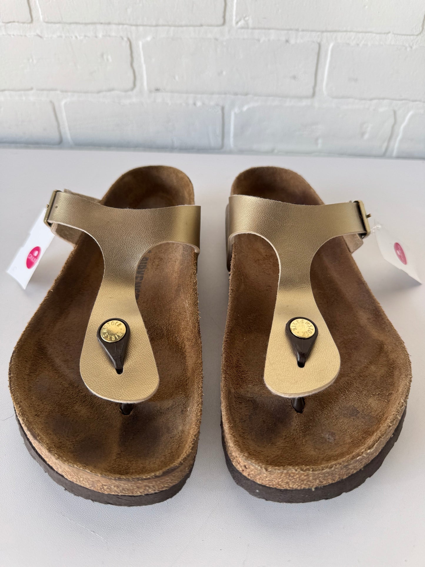 Sandals Flats By Birkenstock In Gold & Tan, Size: 9.5