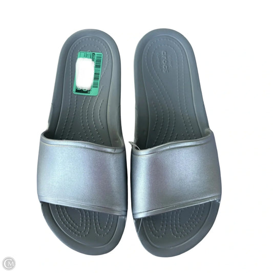 Sandals Flip Flops By Crocs In Silver, Size: 10