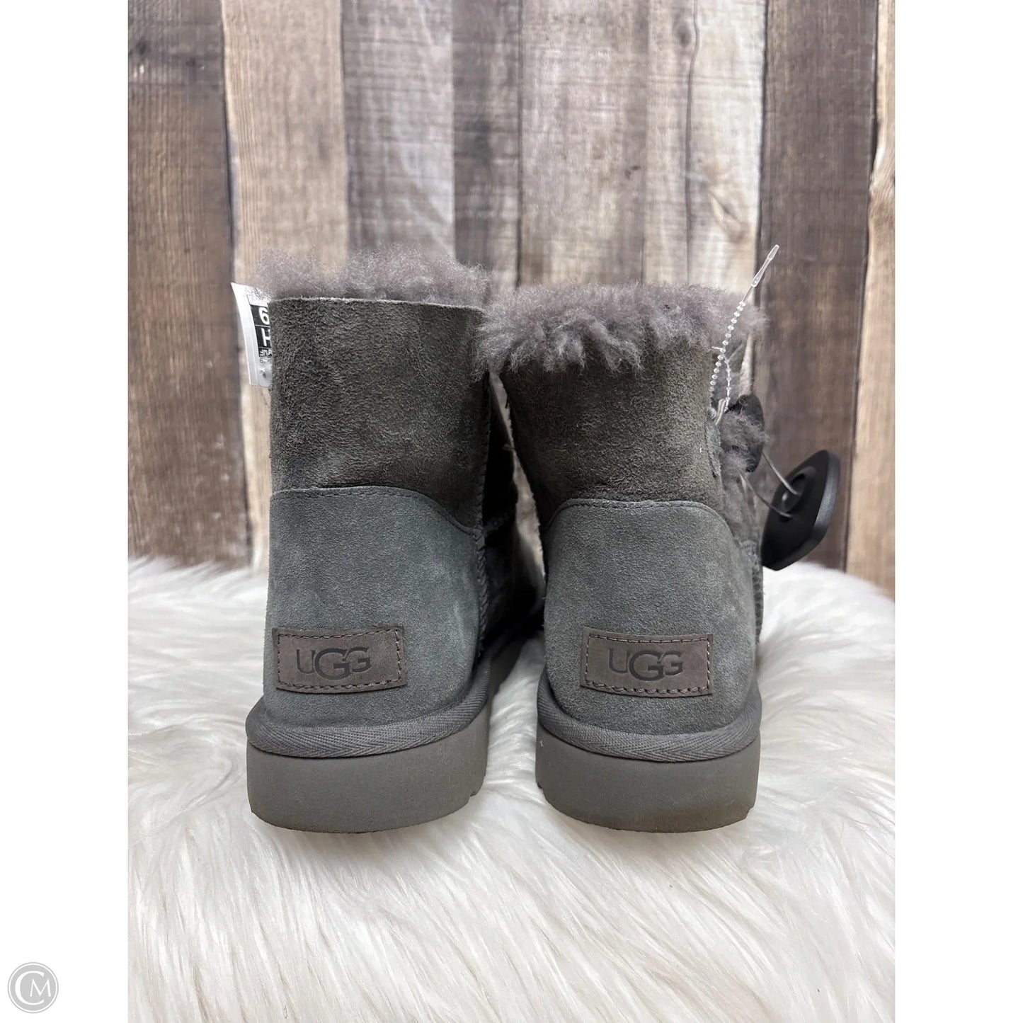 Boots Designer By Ugg In Grey, Size: 9