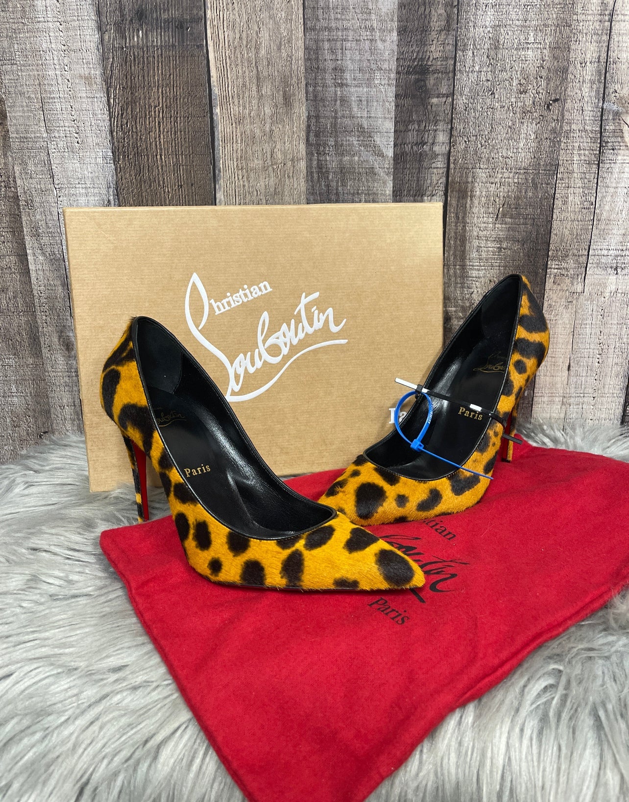 Shoes Luxury Designer By Christian Louboutin In Animal Print, Size: 7.5