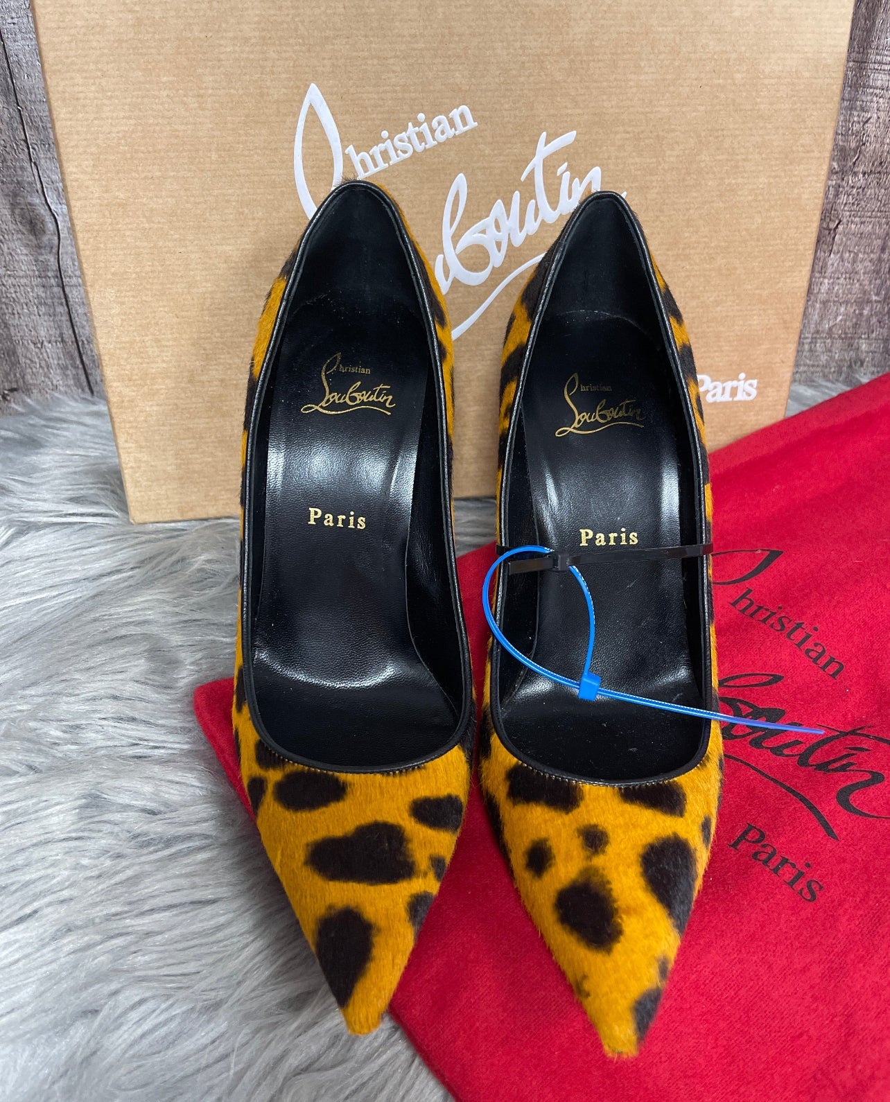 Shoes Luxury Designer By Christian Louboutin In Animal Print, Size: 7.5