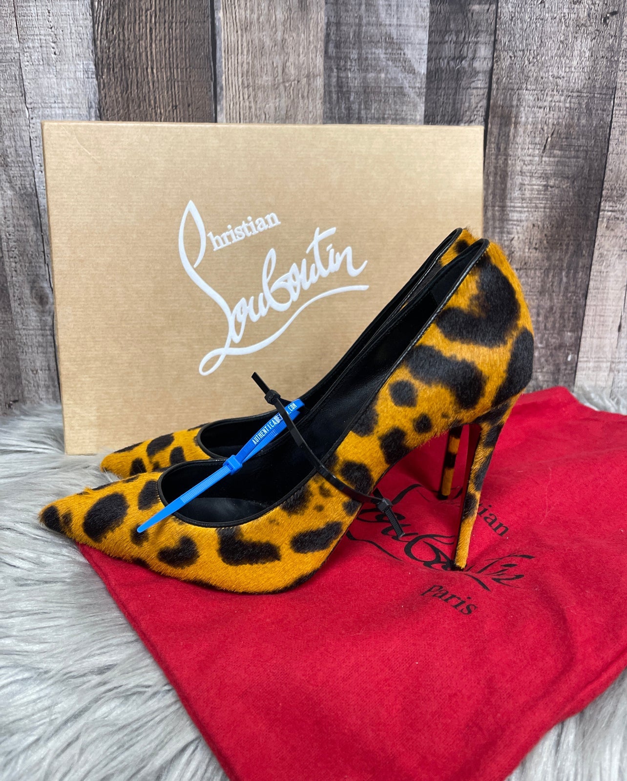 Shoes Luxury Designer By Christian Louboutin In Animal Print, Size: 7.5