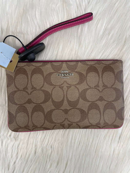 Wristlet Designer By Coach, Size: Medium