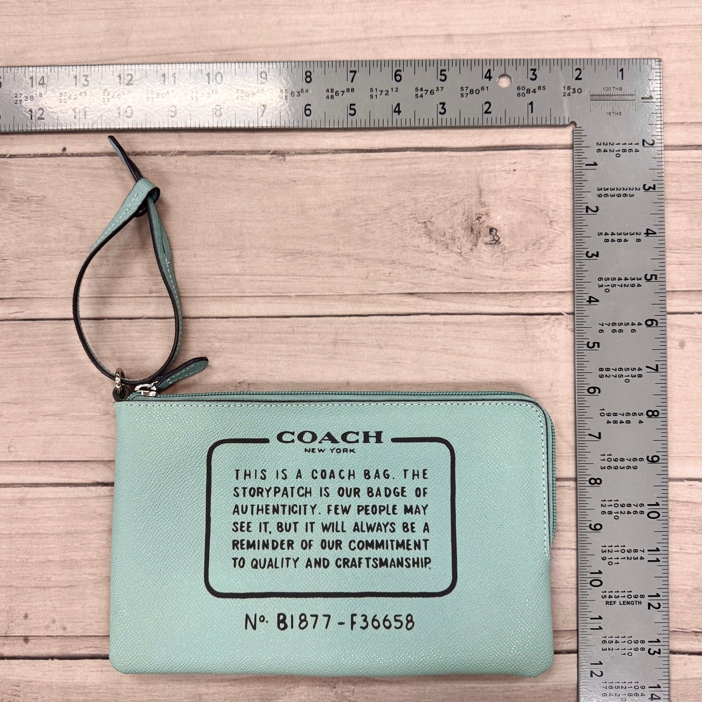 Wristlet Designer By Coach, Size: Medium