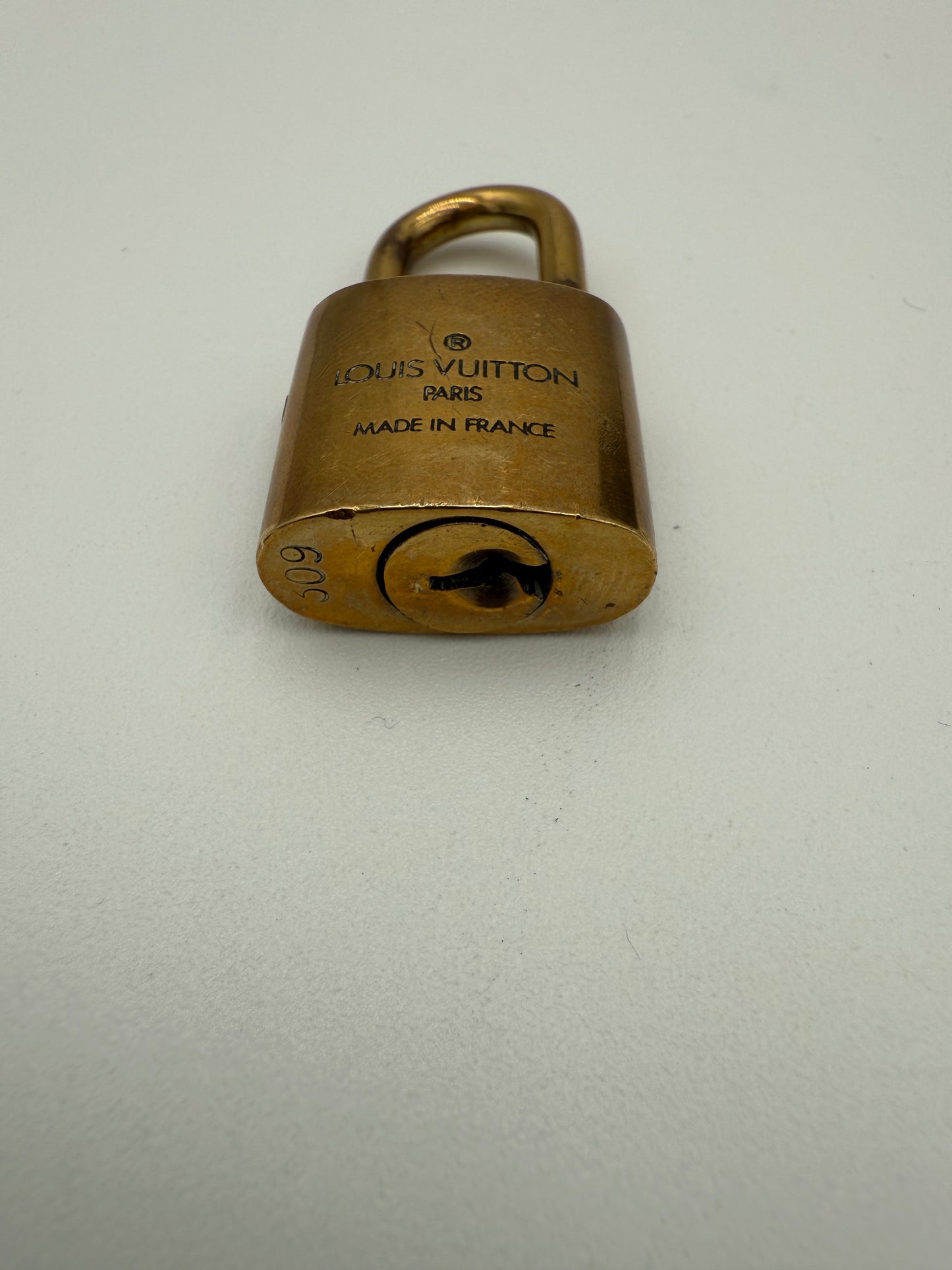 Accessory Luxury Designer Tag By Louis Vuitton In Gold