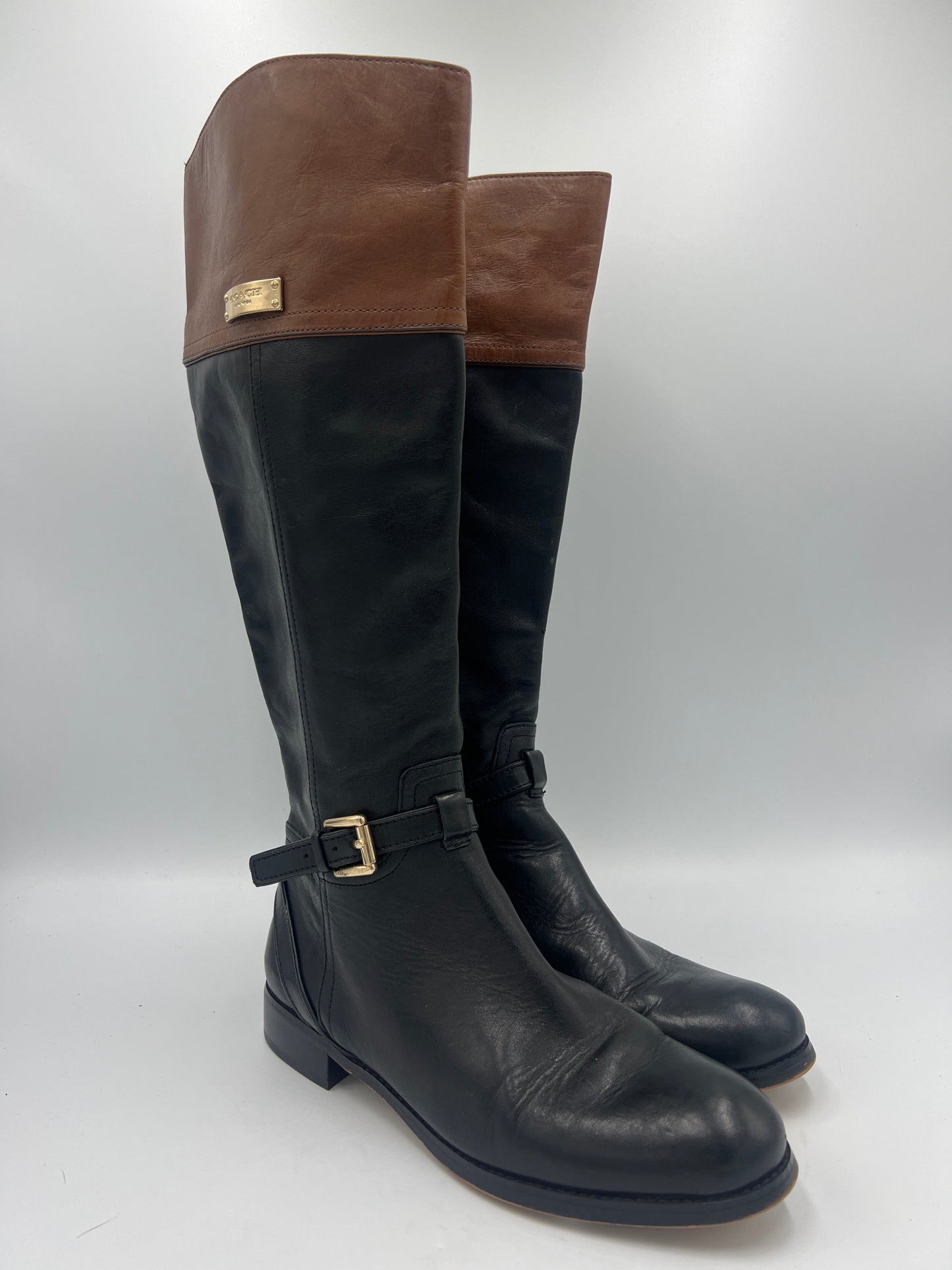 Boots Designer By Coach  Size: 7